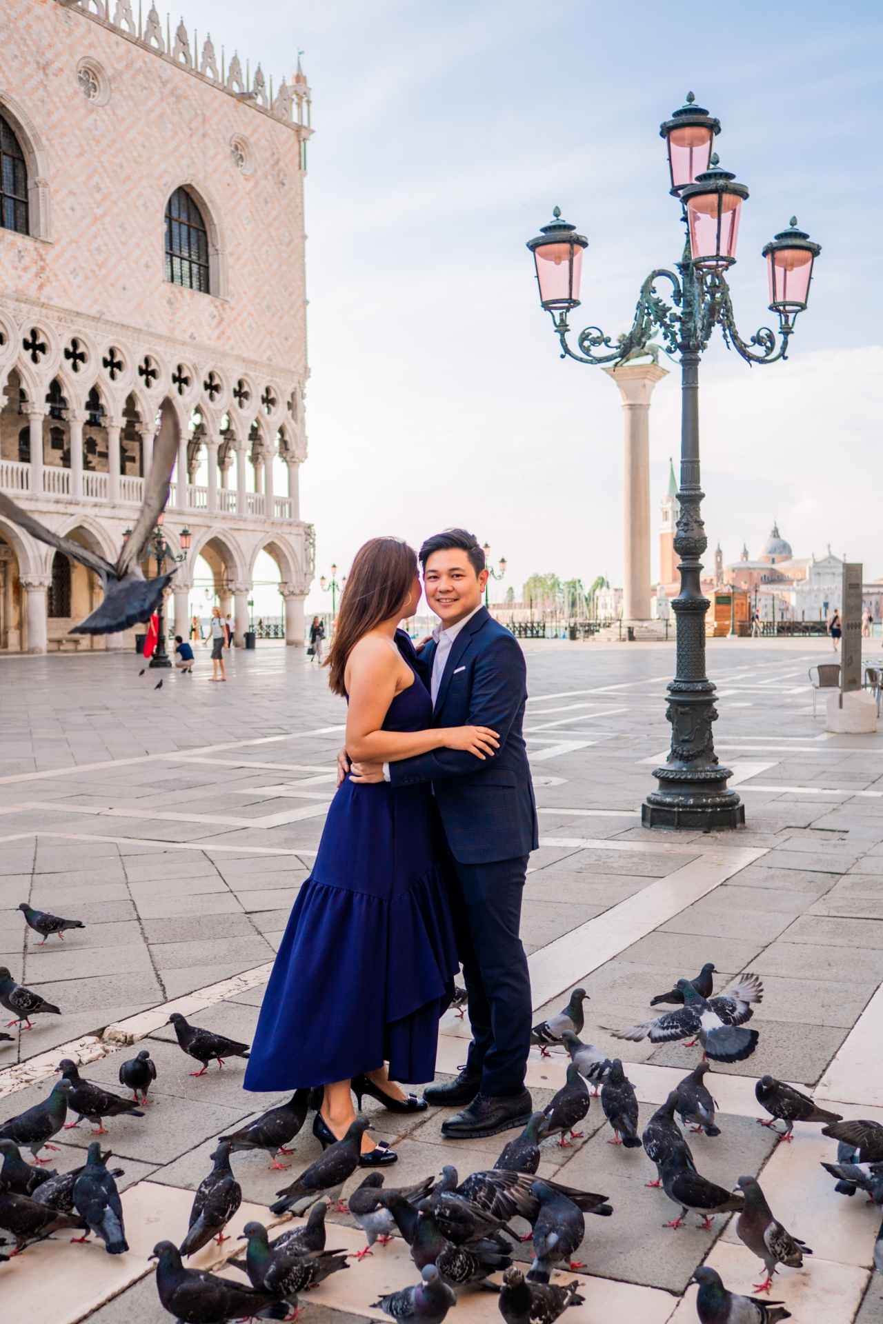 Romantic engagement photo-shoot at sunrise in empty Venice